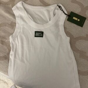 Daily drills logo tank